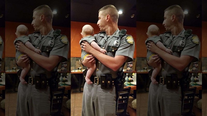 Viral Aksi Polisi Ganteng Bantu Ibu Gendong Bayi yang Rewel di Restoran, Super Gemas!